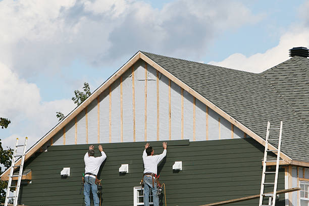 Professional Storm Damage Siding Repair technician working in Trinity, TX